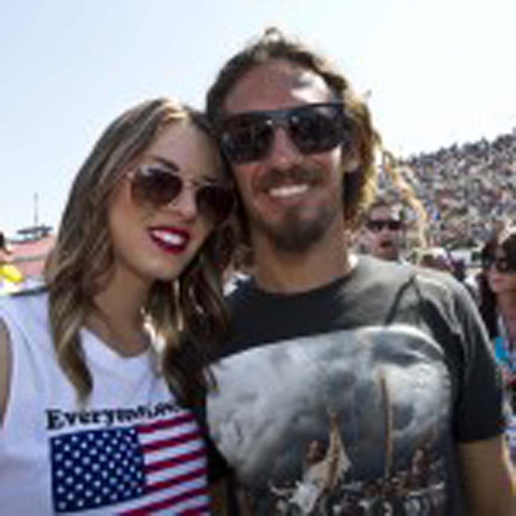 Cardiff residents Rob Machado and his girlfriend, Sophie Vilardo hang out in the pits before the race. Photo by Daniel Knighton