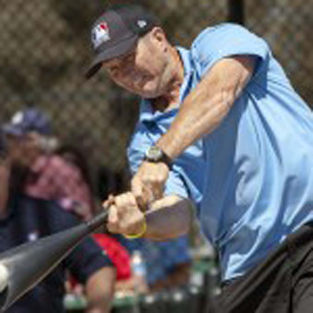 Mike Sweeney smashes a ball at the Miracle League of San Diego’s Home Run Derby in Del Mar. Photo by Bill Reilly