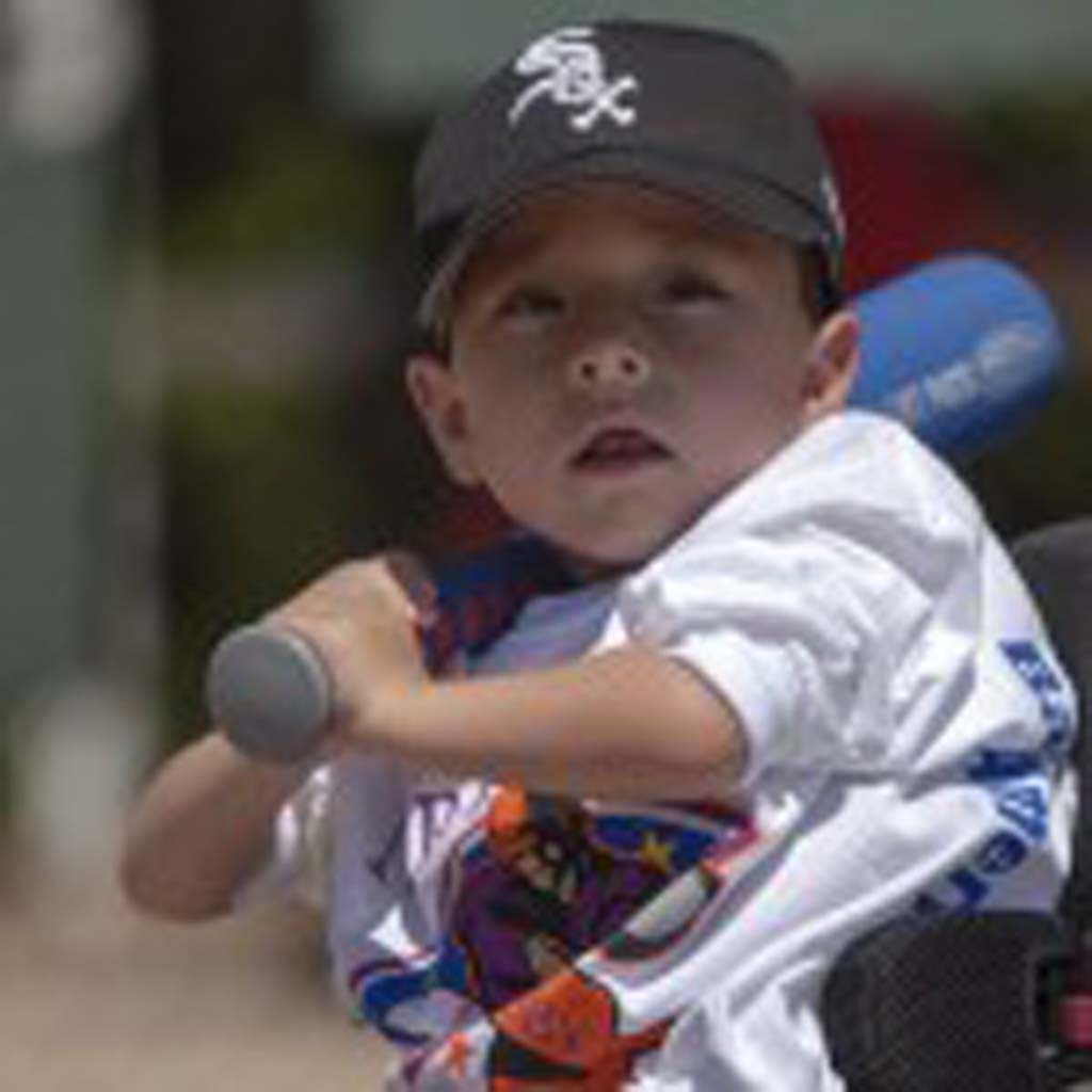 Hayden Welsh participates in the Miracle League of San Diego. Photo by Bill Reilly