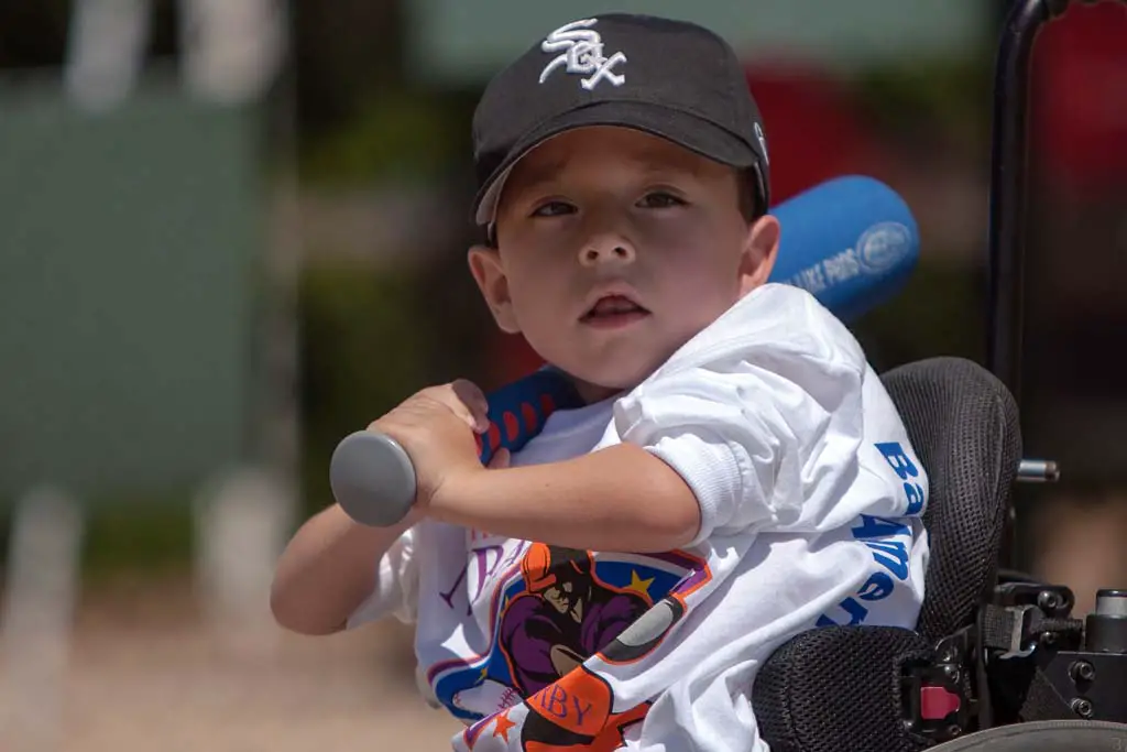 Hayden Welsh participates in the Miracle League of San Diego. Photo by Bill Reilly
