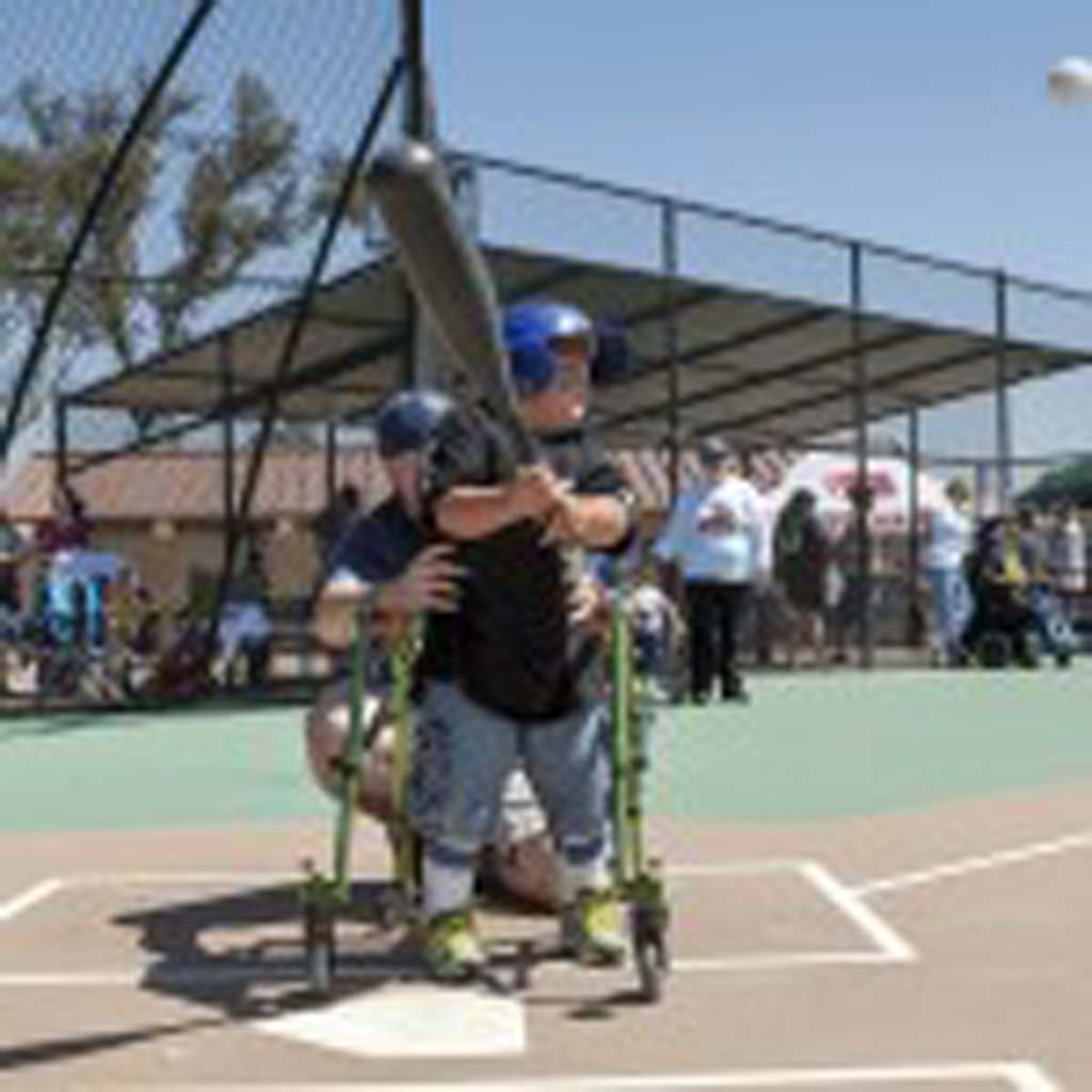 Aiden Bullington of Coronado participates in the Miracle League of San Diego. Photo by Bill Reilly