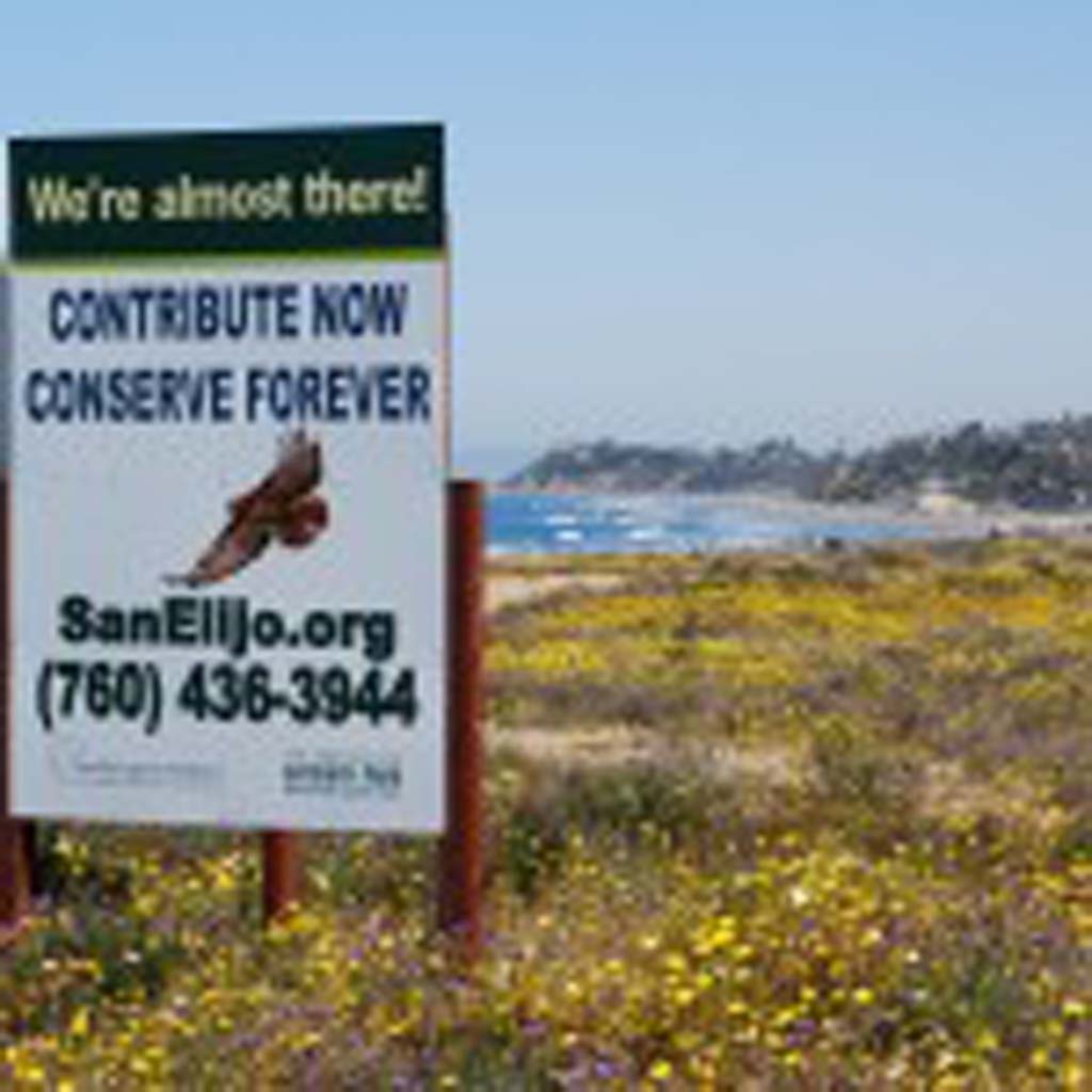 A sign denotes that the San Elijo Lagoon Conservancy has secured a large portion of the money it needs to finalize its purchase of the Gateway Property. The conservancy wants to protect the land from development. Photo courtesy of San Elijo Lagoon Conservancy