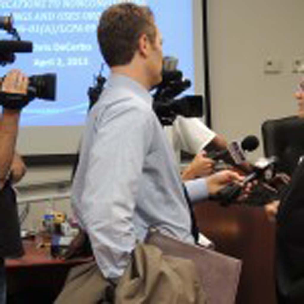 Mayor Matt Hall (right) answers questions from local television media after the City Council declared its approval of the Quarry Creek project with 656 homes at the April 2 meeting. Photo by Rachel Stine