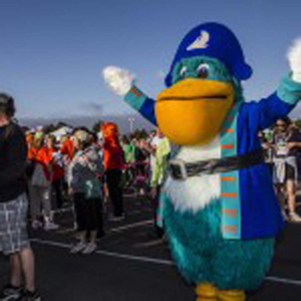 “Captain Bill,” the San Diego County Credit Union mascot helps lead morning calisthenics before the MS Walk begins. Photo by Daniel Knighton
