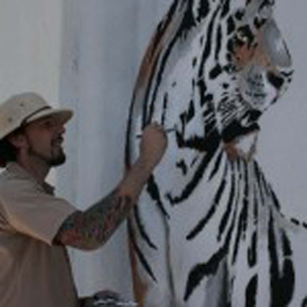 Michael Summers will be painting his mural at 2906 Carlsbad Blvd. through May 10. The Mural Project also includes murals by artists Jason Markow, Ron Juncal and Phyllis Swanson, and Lauren Lee. Photo by Promise Yee