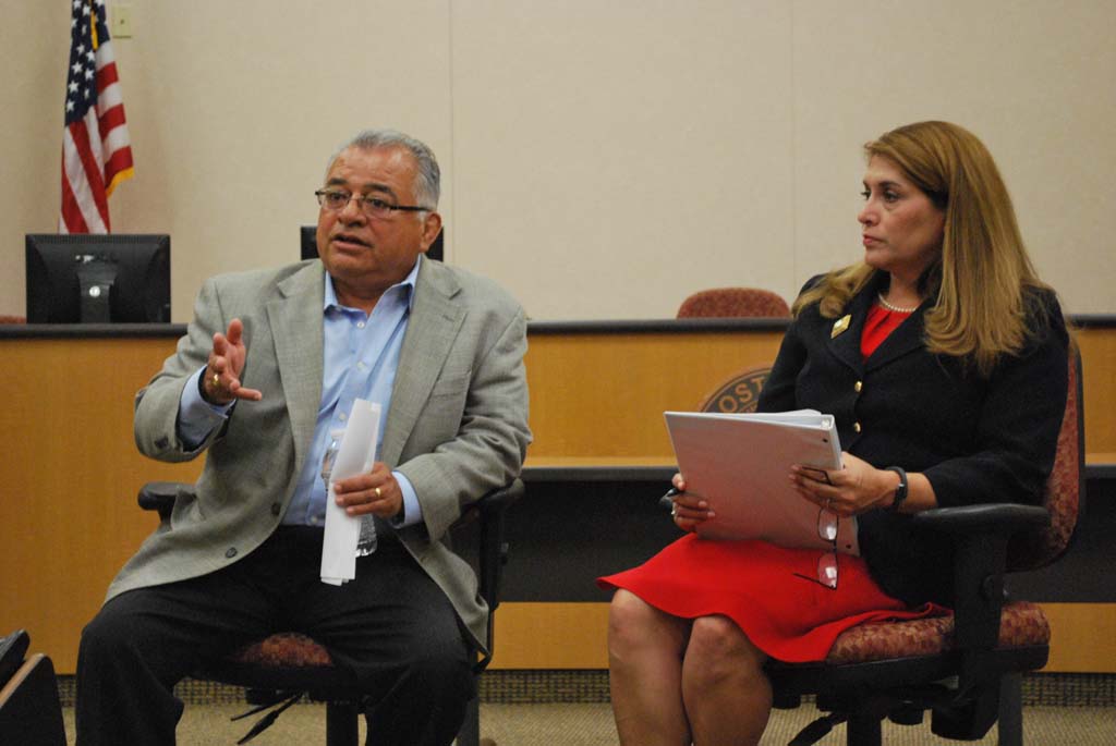 Assemblymembers Rocky Chavez, left, and Sharon Quirk-Silva discuss the benefits of Assembly Bill 13, and explain that veterans cannot afford out of state tuition using the GI Bill at a town hall meeting on Tuesday. Photo by Ian Brophy