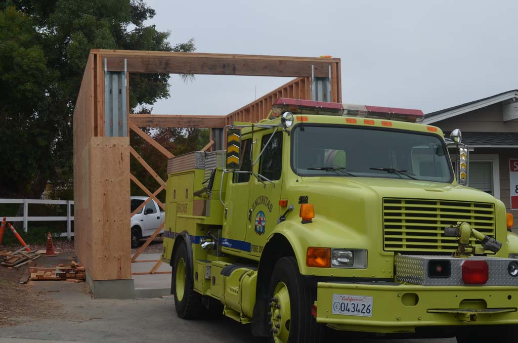 A Type 3 fire engine sits out front of a partially completed garage at Fire Station No. 6 in Olivenhain. Since going from 12-hours of operation to 24-hours, and the addition of three new firefighters, the station is undergoing several upgrades. Photo by Tony Cagala