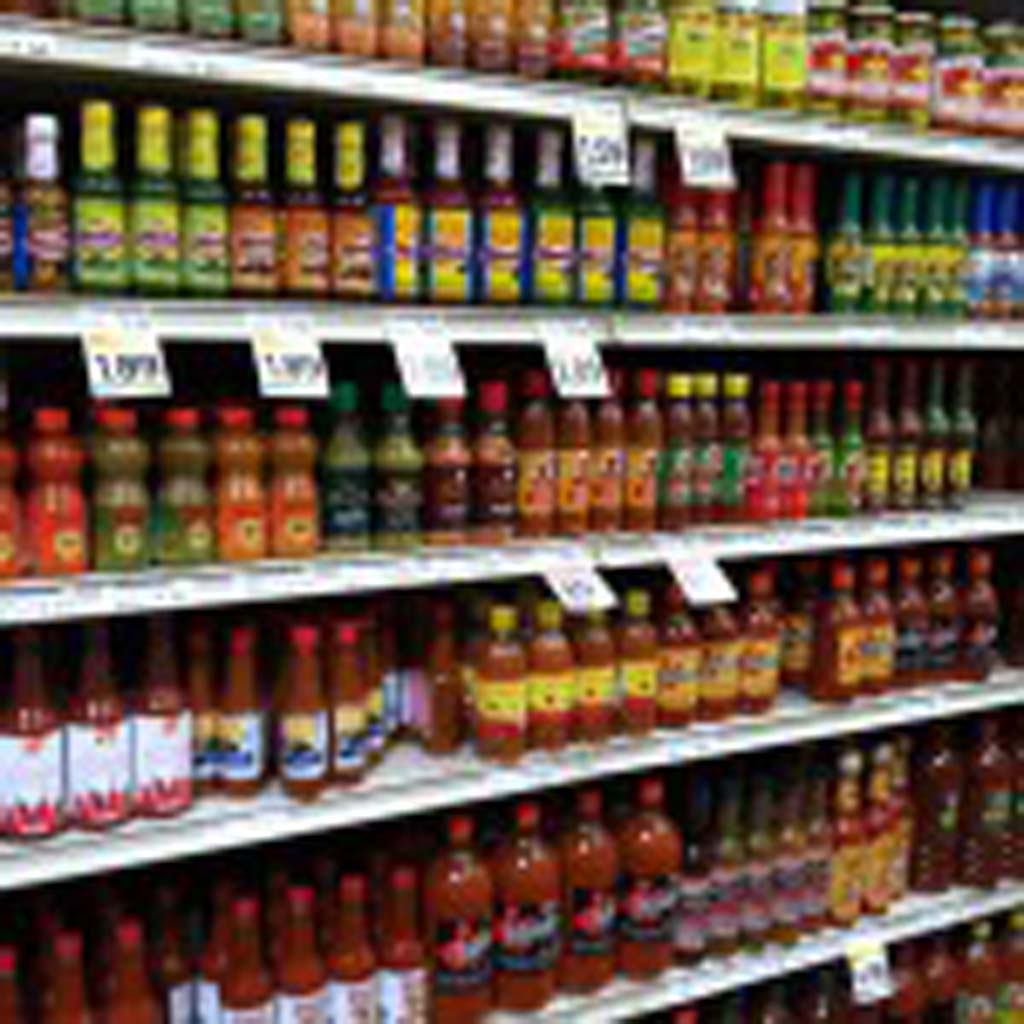 Dozens of different brands of salsa and hot sauce line the shelves at the recently opened Northgate Market in Barrio Logan (1950 Main St.; corner of Cesar Chavez Parkway and Main Street). The market offers an array of unique produce not often found in other markets, freshly baked breads and pastries, a butcher and a tortilleria. The lunch crowd can enjoy al fresco dining with food from the cafeteria, which serves generous, affordable portions of authentic Mexican food made daily on site. [Photo by E’Louise Ondash]