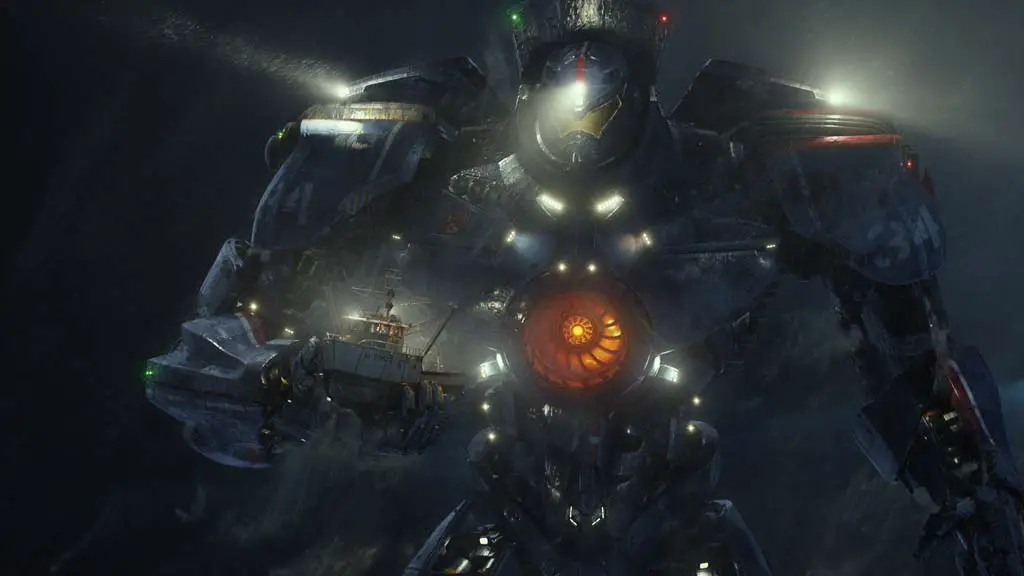 The United States' Gipsy Danger moves a crab fishing boat out of dangerin a scene from the sci-fi action adventure “Warner Bros. Pictures and Legendary Pictures Pacific Rim.” Photo courtesy of Warner Bros. Pictures
