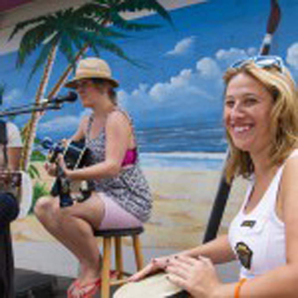 Leucadia musician Megan Combs, center performs with Los Angeles musician Marisa DeMeglio, left, and Carlsbad musician Meryl Klemow. Photo by Daniel Knighton