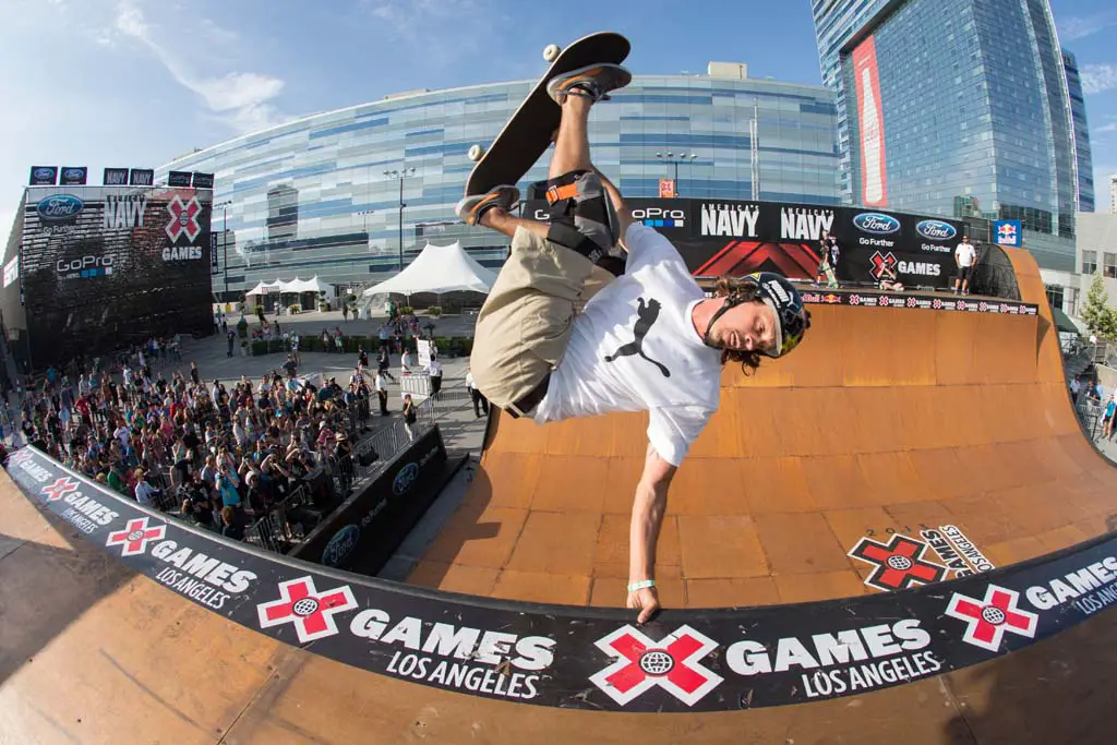 Encinitas skateboarder Bucky Lasek handplants on a halfpipe at the X-Games. His recent win this past Saturday means he’s taken home four gold medals in a row at skateboarding events this year. Photo by Bryce Kanights / ESPN Images