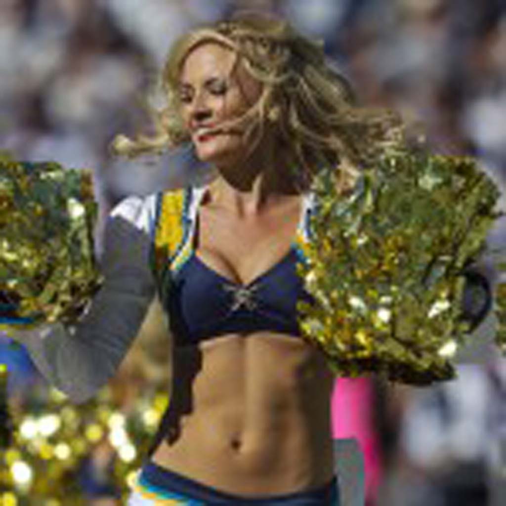 San Diego Chargers Girls perform for the crowd as the Chargers beat the Dallas Cowboys 30-21 at home on Sunday. Photo by Bill Reilly