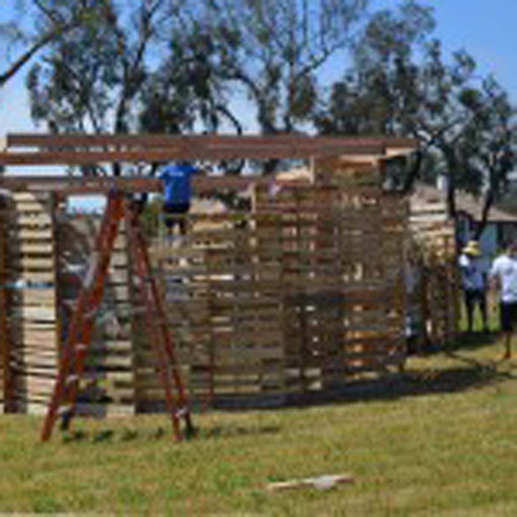 Volunteers work on a Sukkah — a temporary structure that represents harvests among the Jewish community — on Sept. 15. The Leichtag Foundation wants to promote agricultural heritage with more events like the Sukkah Design Festival. Photo by Jared Whitlock