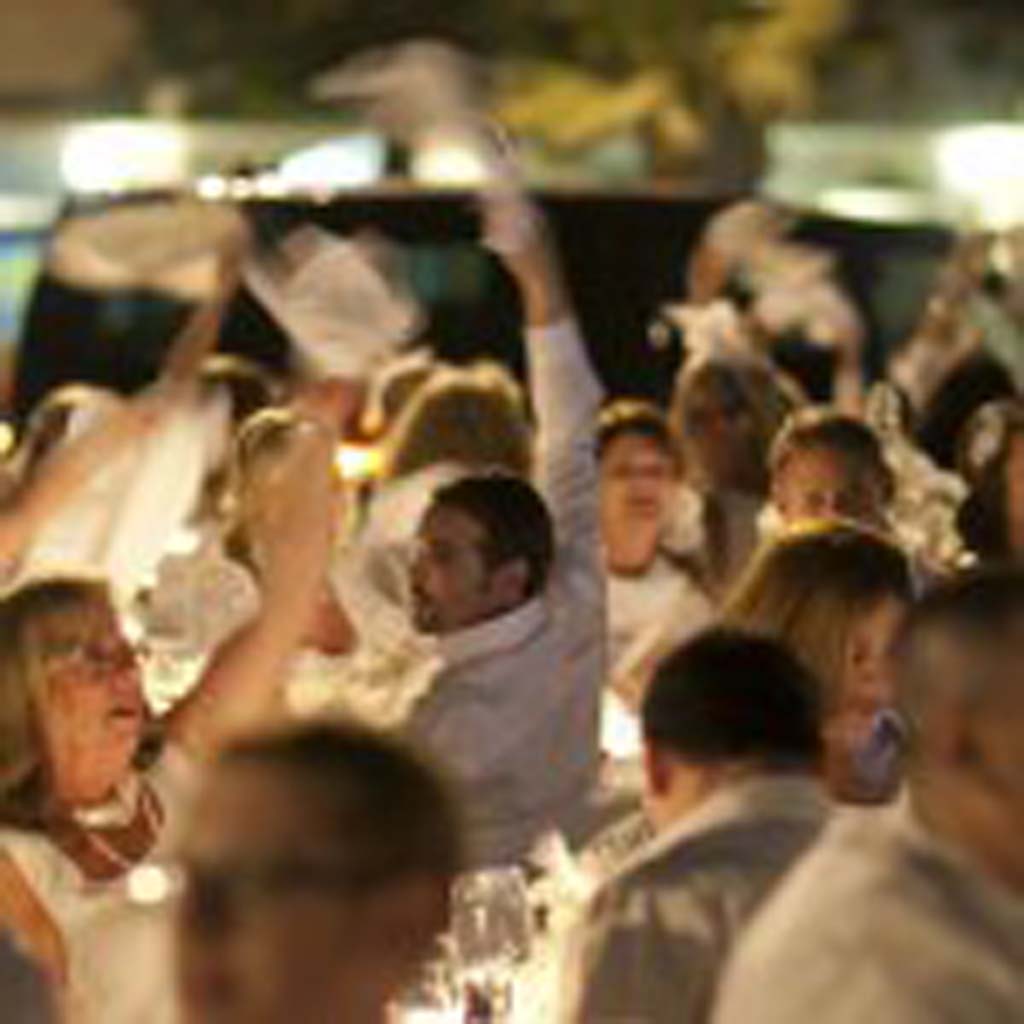 The second annual Diner en Blanc will take place somewhere in San Diego Sept. 19. Once all of the guests arrive they can then sit down where they proceed to wave their napkins in the air, signifying the start of dinner. Photo by Jennifer Dery