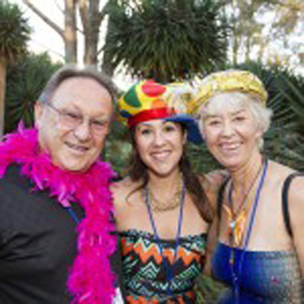 San Marcos residents Richard Borevidz, Shona Borevidz, and Mary Borevidz dress up for a photo booth provided by San Diego based Starlight Photo Booth. Photo by Daniel Knighton