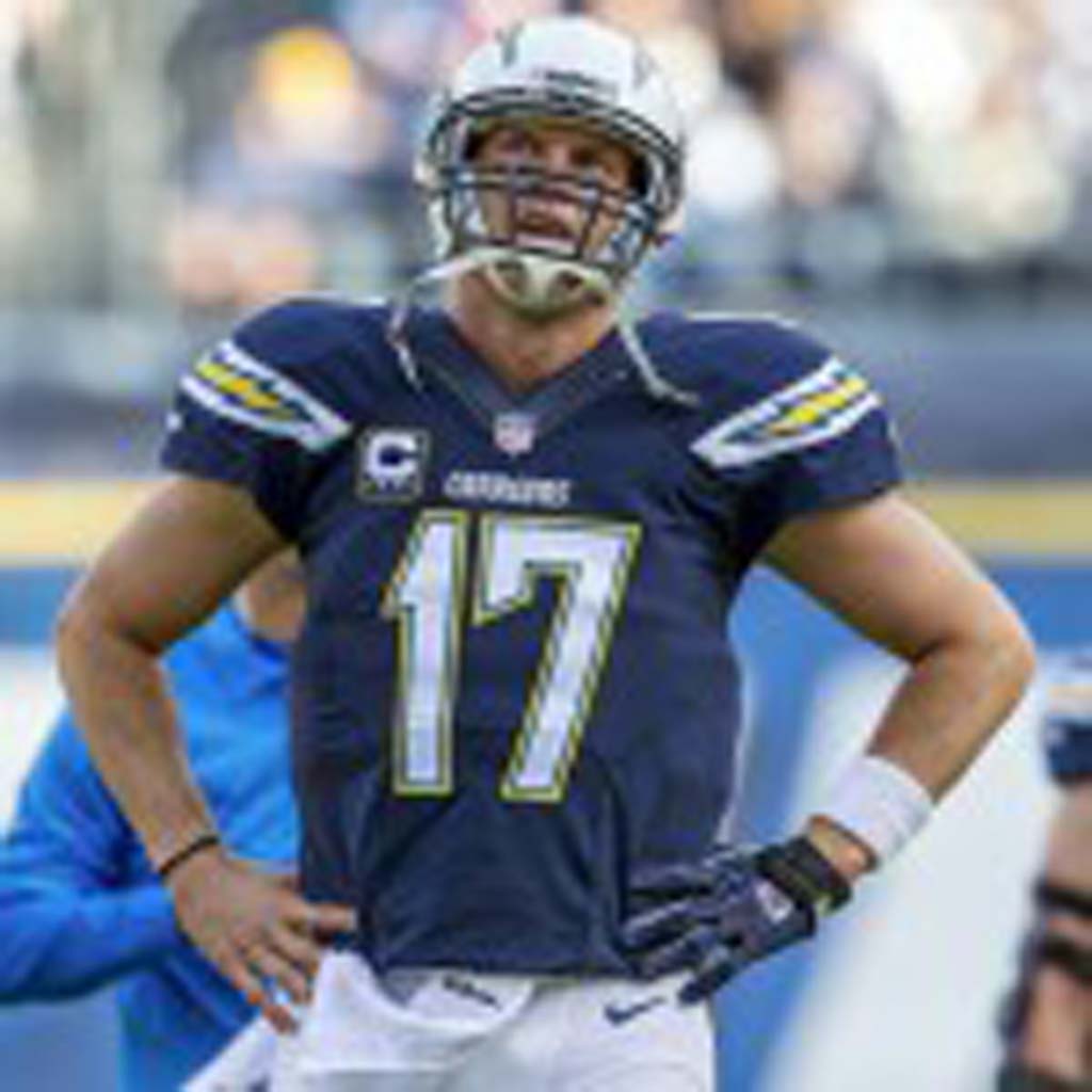 Chargers quarterback Philip Rivers (17) watches a replay of the previous play that ultimately resulted in a touchdown.