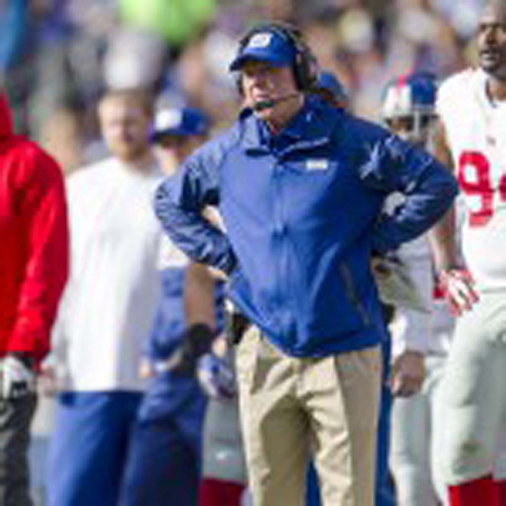 Giants coach Tom Coughlin shows his frustration after the Giants fumble in the third quarter.