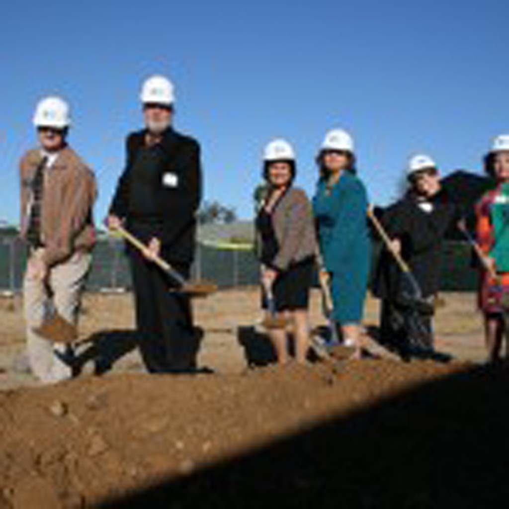 Mayor Jim Wood, Dr. Brad Beck, Ellen Stotmeister, Irma Cota, Gigi Gleason, and Dr. Chanelle Calhoun break ground for the Mission Mesa Pediatrics Health Center. The new facility will be four times the size of the current clinic. Photo by Promise Yee