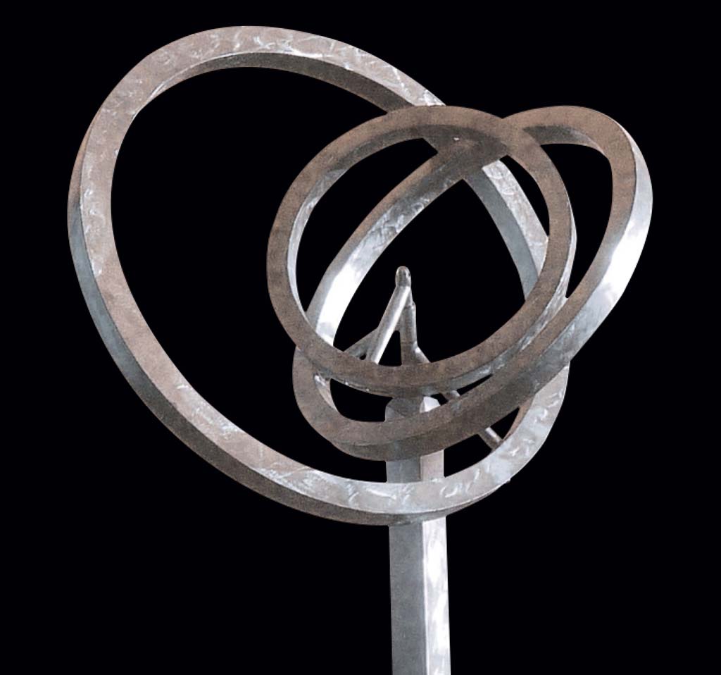 “Ripples,” a stainless steel and titanium sculpture by Jeffery Laudenslager, along with dichroic glass and metal works by Deanne Sabeck, will be on exhibit at the Carlsbad Sculpture Garden through June 2014. Courtesy photo