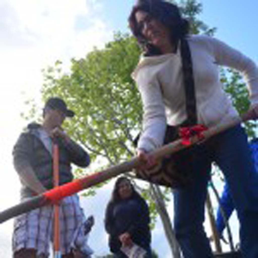 Volunteers help dig in to celebrate Arbor Day on April 5. Photo by Tony Cagala