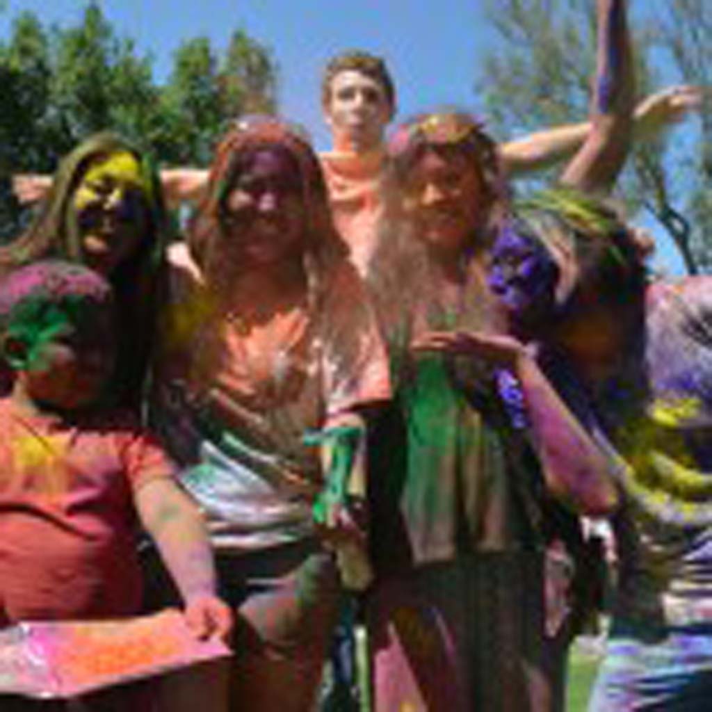 Friends enjoy themselves at the Festival of Colors in Escondido. Photo by Tony Cagala