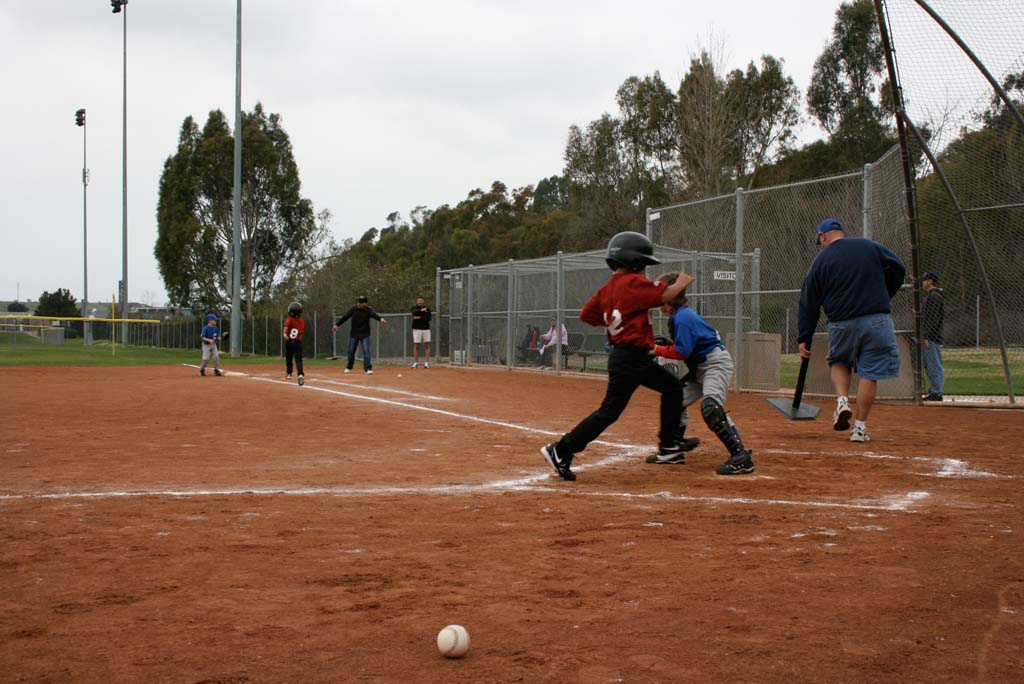 Little League rules require well-lit fields for evening games and practices. Oceanside’s hourly rate for field lights is higher than neighboring cities. Photo by Promise Yee