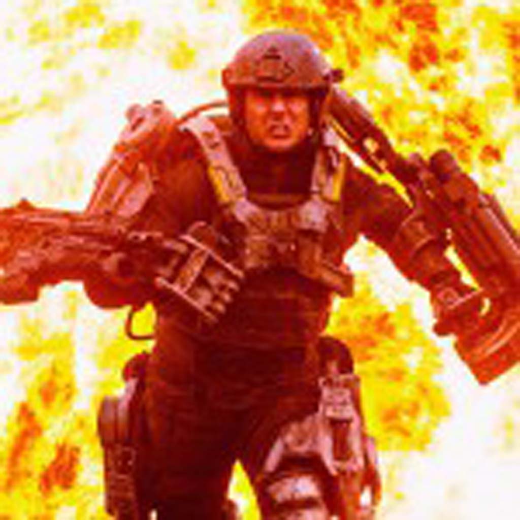 Major William Cage (Tom Cruise) relives the same day over and over again while battling aliens in “Edge of Tomorrow.” Photo by David James