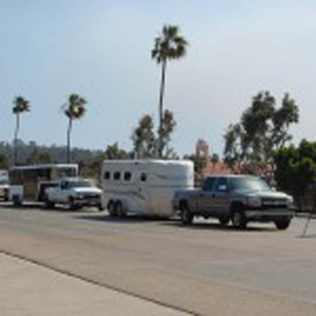 Not long after the Bernardo fire broke out May 13, horse trailers lined up on Jimmy Durante Boulevard as the Del Mar Fairgrounds took in evacuated animals. Photo by Bianca Kaplanek