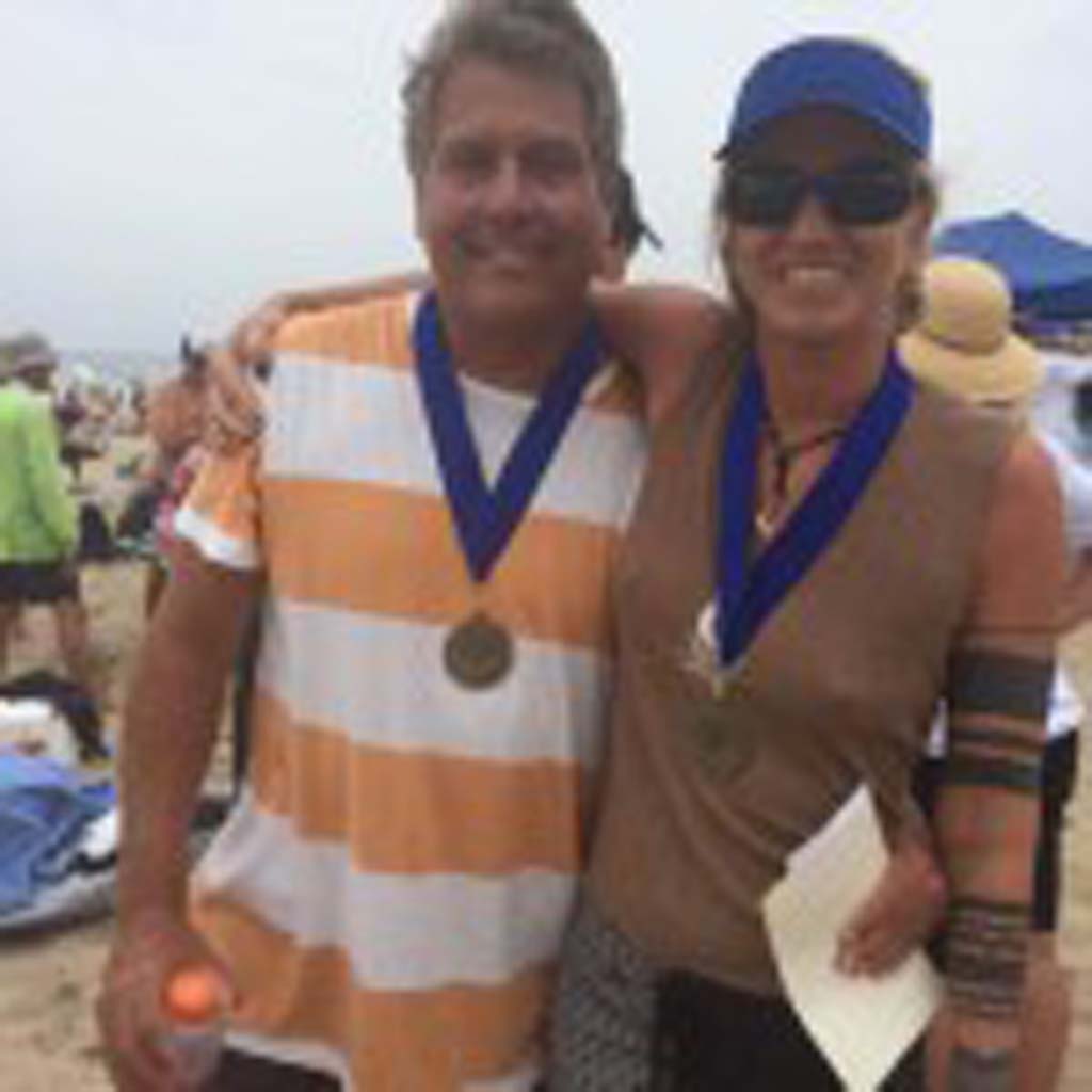 Members of the Del Mar BodySurfing Club, Dave Lane and Briguitte Wiedemeyer, earned Gold Medals at the Aug. 4 International Bodysurfing Championships. Courtesy photos