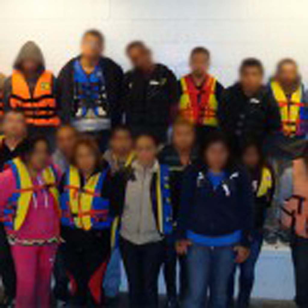 Thirteen men and seven women were arrested — two men will be charged with human smuggling. Photo courtesy U.S. Customs and Border Protection’s Office of Air and Marine