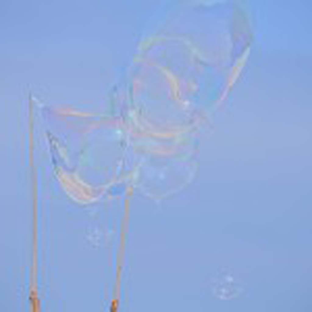 Alan Kier makes large bubbles at Tamarack Beach on Sunday. Photo by Tony Cagala