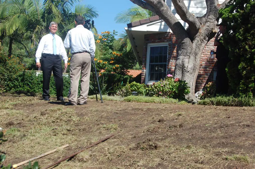 County Supervisor Dave Roberts answers a reporter’s questions about the removal of his front and back lawns, which are being replaced with artificial turf for an expected annual savings of 264,000 gallons of water. Photo by Bianca Kaplanek