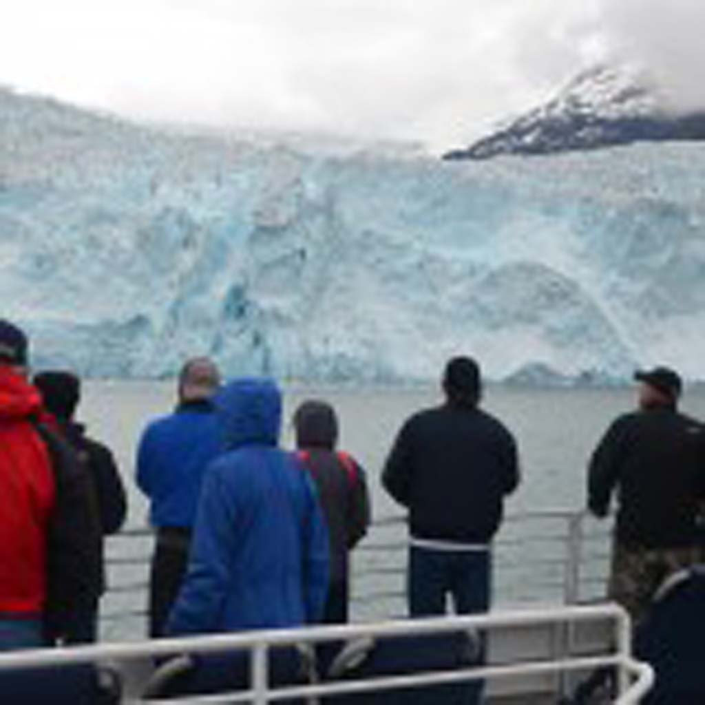 Passengers on the Orca Voyager gather on deck to watch “calving” of the glaciers – the process in which large chunks of snow and ice break away from the glacier and fall into the Gulf of Alaska with a thunderous roar. Hours can pass between events, or a dozen can occur in rather rapid succession.