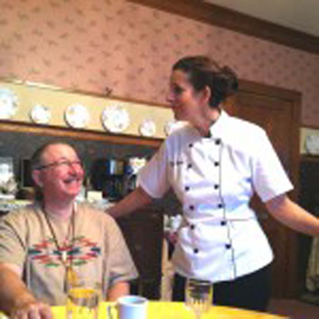 Mark Ransom of Anchorage shares a joke with Adrian Potter, co-owner and chef at Abilene’s Victorian Inn. Potter loves to cook and happily caters to those with special dietary needs. The nearly 6,800-square-foot, three-story inn was built in 1887 by a town doctor and has been restored to its 1920s splendor. The wide, welcoming front porch and large parlors are perfect gathering places. Discounts available for renting entire house. Visit HYPERLINK "http://www.abilenesvictorianinn.com" www.abilenesvictorianinn.com or call 888-807-7774. (Photo by E’Louise Ondash)