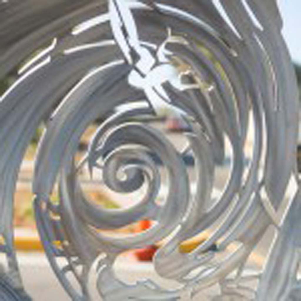 The Carlsbad Cultural Arts Office installs Roger Stoller’s sculpture, “Coastal Helix,” at the new roundabout at Carlsbad Boulevard and State Street in 2014. It is now considering a new art plan. Courtesy photo