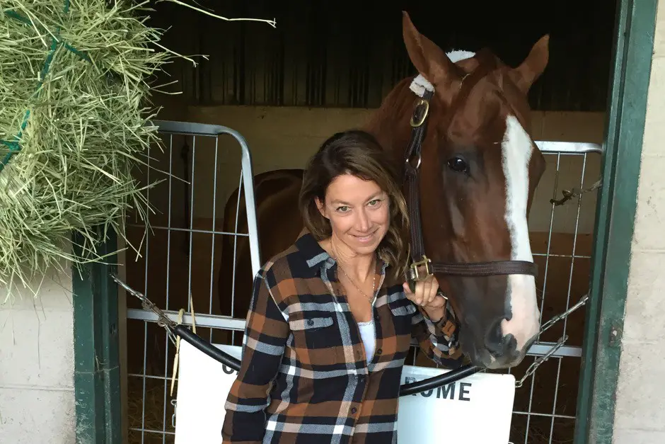 Paula Besset, a Torrey Pines High School alum and Encinitas resident is helping train California Chrome, a candidate for horse of the year. Courtesy photo