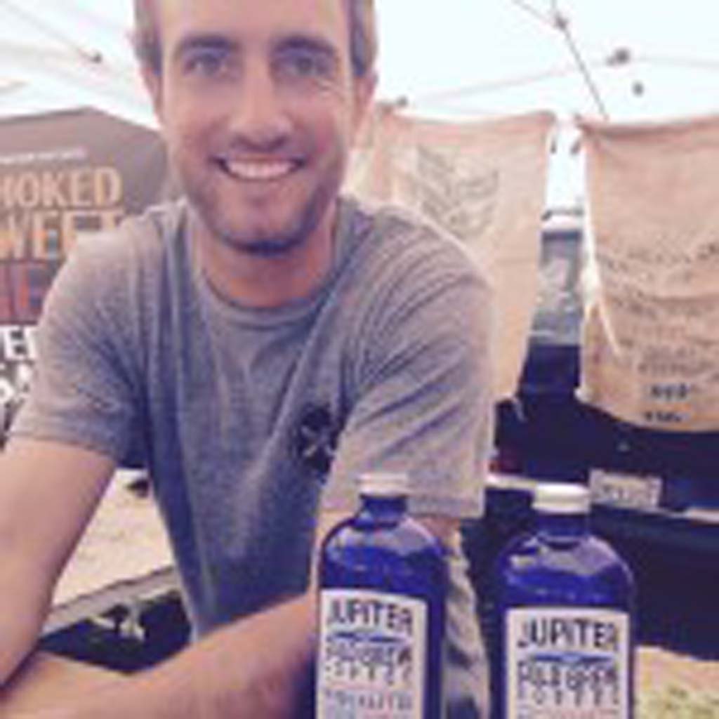 Scott MacBride from Jupiter Cold Brew Coffee and their cool blue bottles. Photo by David Boylan