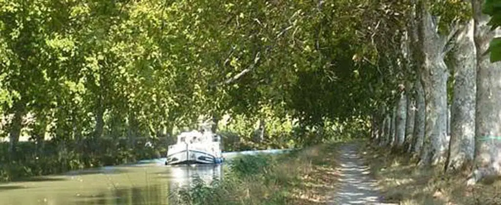 The most romantic way to travel in the Minervois wine appellation in the South of France is the Canal Du Midi, a source of river transport for Chateau de Paraza. Photo courtesy Canal di Midi