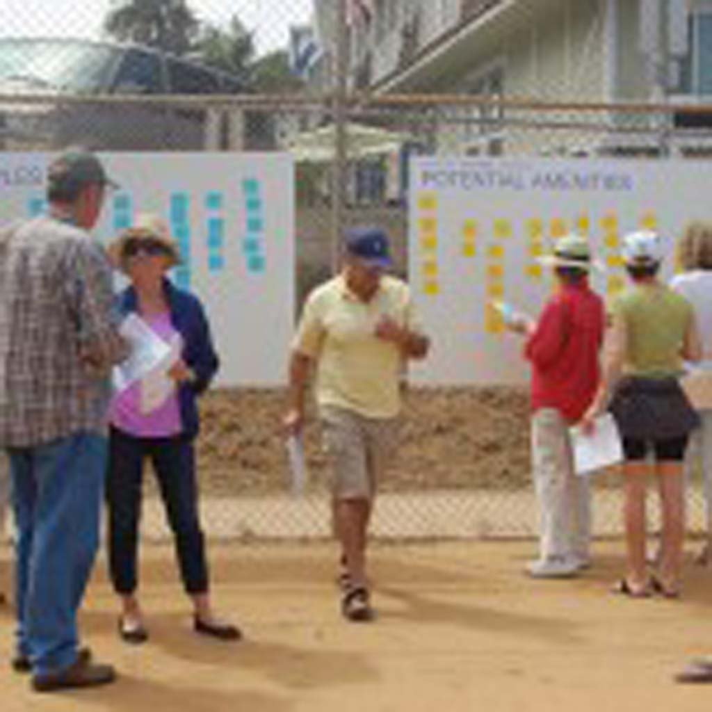 Residents post their ideas for what should be included in the development of the Shores property during an onsite May 2 workshop that concluded with barbecue compliments of the design consultants, Schmidt Design Group. Photo by Bianca Kaplanek