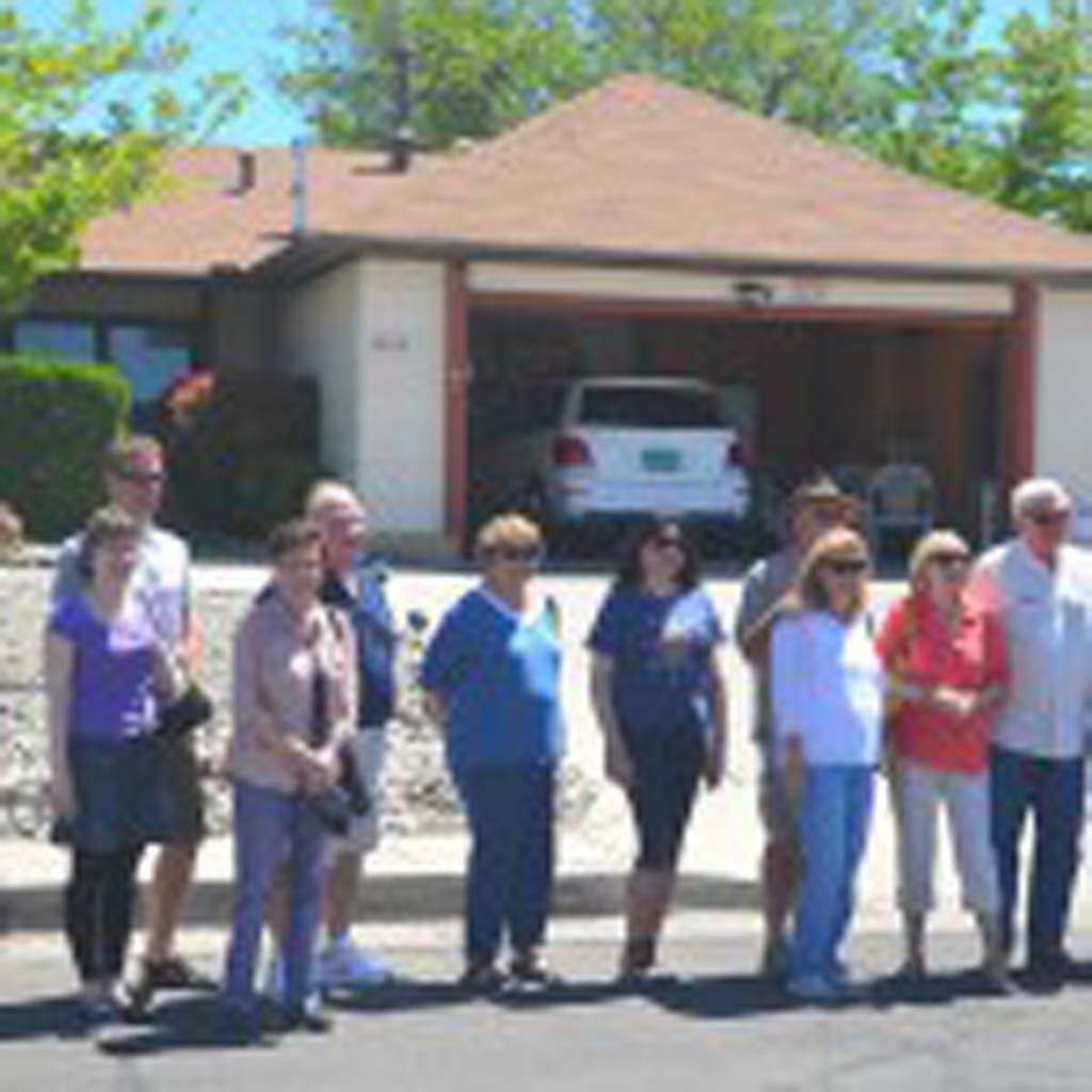 Tourists are a common sight at the Albuquerque residence that served as Walter White’s home in “Breaking Bad.” Owner Fran Padilla says that as many as 200 cars a day pass by. This tour group, which includes visitors from London and Switzerland, lines up for a photo. The Breaking Bad RV Tour takes passengers to 17 Albuquerque locations, and has recently added locations from “Better Call Saul,” a popular “Breaking Bad” spinoff, currently filming Season 2.