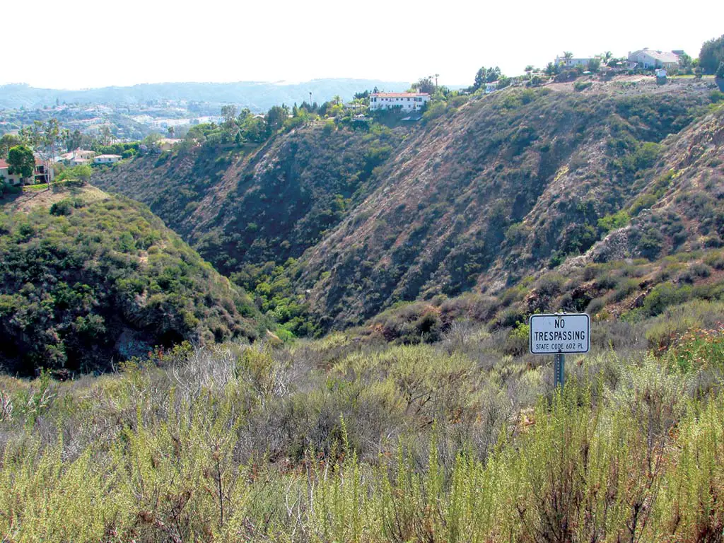 Box Canyon is inside the Rancho La Costa Preserve area. When the weather warms up, teens and young adults are drawn to the canyon to swim and sometimes cliff jump. Photo by Ellen Wright
