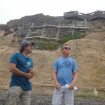 Mark West, left, and Tom Cook of the Surfrider Foundation lead a walking tour of seawalls in Encinitas on Monday. Photo by Aaron Burgin