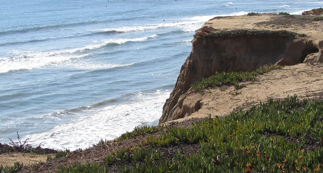 In the early hours of Tuesday morning, two girls were pushed off the cliff at Terramar Beach in Carlsbad. One sustained minor injuries and was taken to Scripps Medical Center in La Jolla. Photo by Ellen Wright