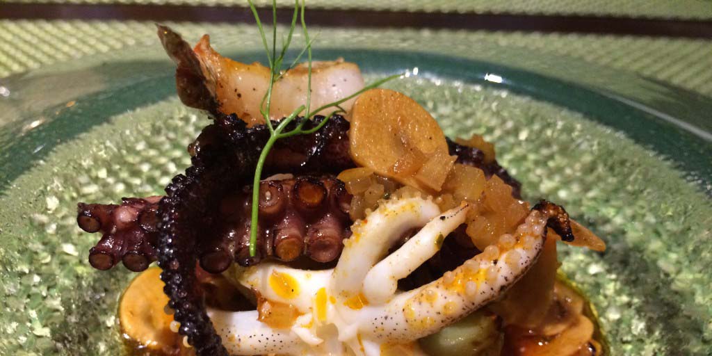 The spectacular grilled octopus at Arterra from new Executive Chef Evan Cruz. Photo by David Boylan