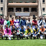 Jockeys pose for a group picture in the paddock prior to the first race of opening day at Del Mar racetrack. Photo by Bill Reilly