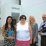 From left: Monica Chapa-Domercq, principal librarian, Sherri Cosby, library director, Kristi Hawthorne, Oceanside Historical Society president, and Tom Reeser, KOCT executive director, join forces to present programs on Latino history. The project will collect local first hand accounts and photos. Photo by Promise Yee