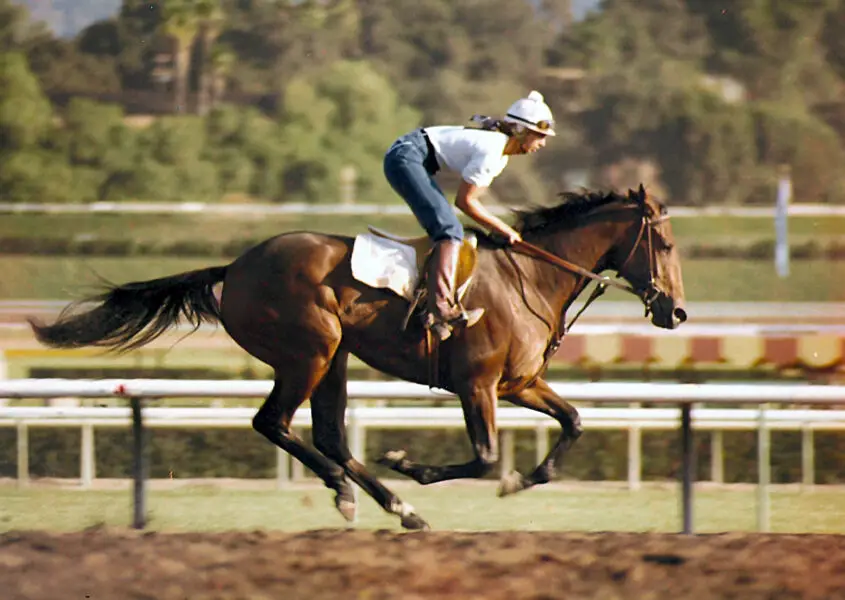 Del Mar Horse Racing: Marla Zanelli, a Solana Beach resident and former assistant trainer, rides a racehorse at Santa Anita Park at the age of 26. 