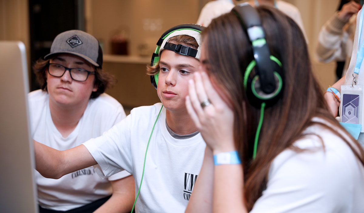 Valley Middle School broadcast students Ryder Dellinger, Scott Daynes and Val Bedoya edit their story for the “Crazy 8 Contest” at the national Student Television Network’s annual convention on Feb. 20 in Long Beach. Courtesy photo