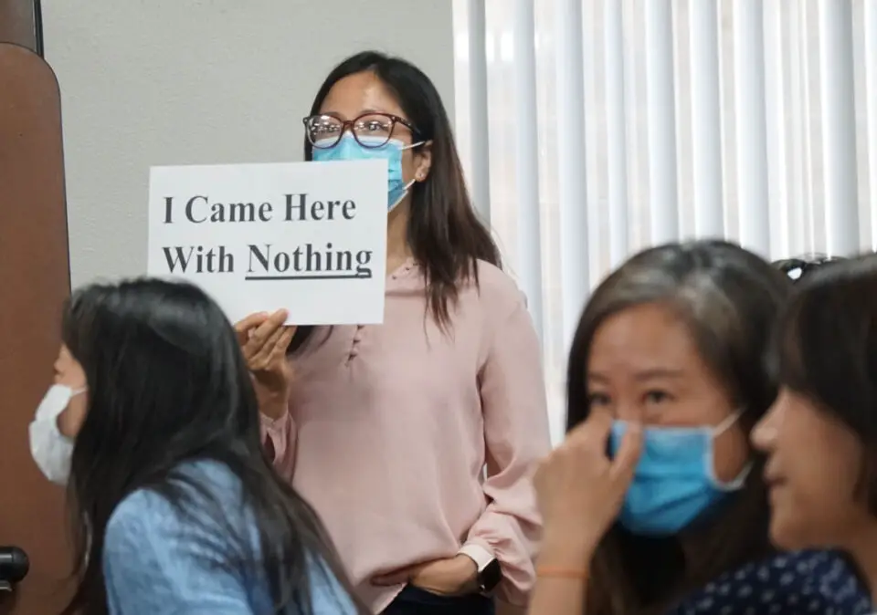 Chinese American community members rallied at Wednesday's San Dieguito Union High School District board meeting to correct the narrative about Chinese families in the district.