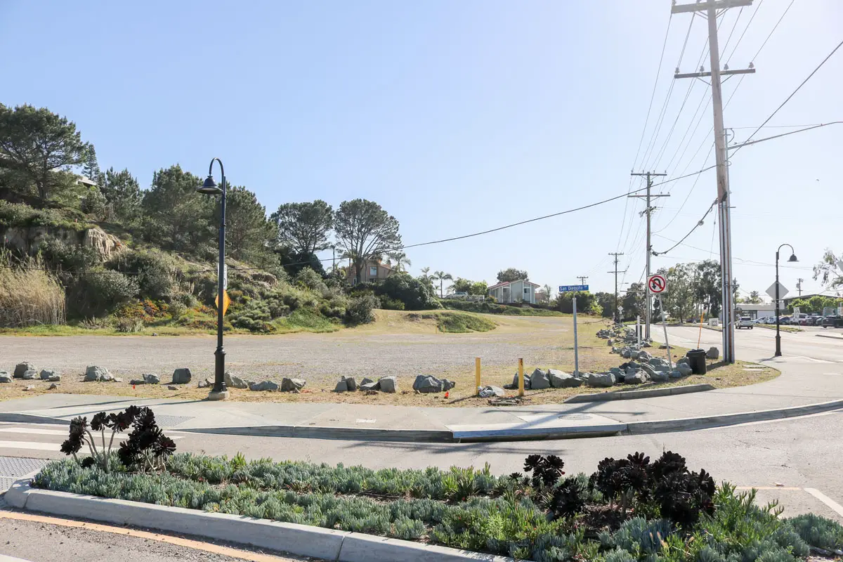 The 50-unit Watermark Del Mar housing project is slated to go in the empty lot at the corner of San Dieguito Drive and Jimmy Durante Boulevard, pending city and California Planning Commission approval.